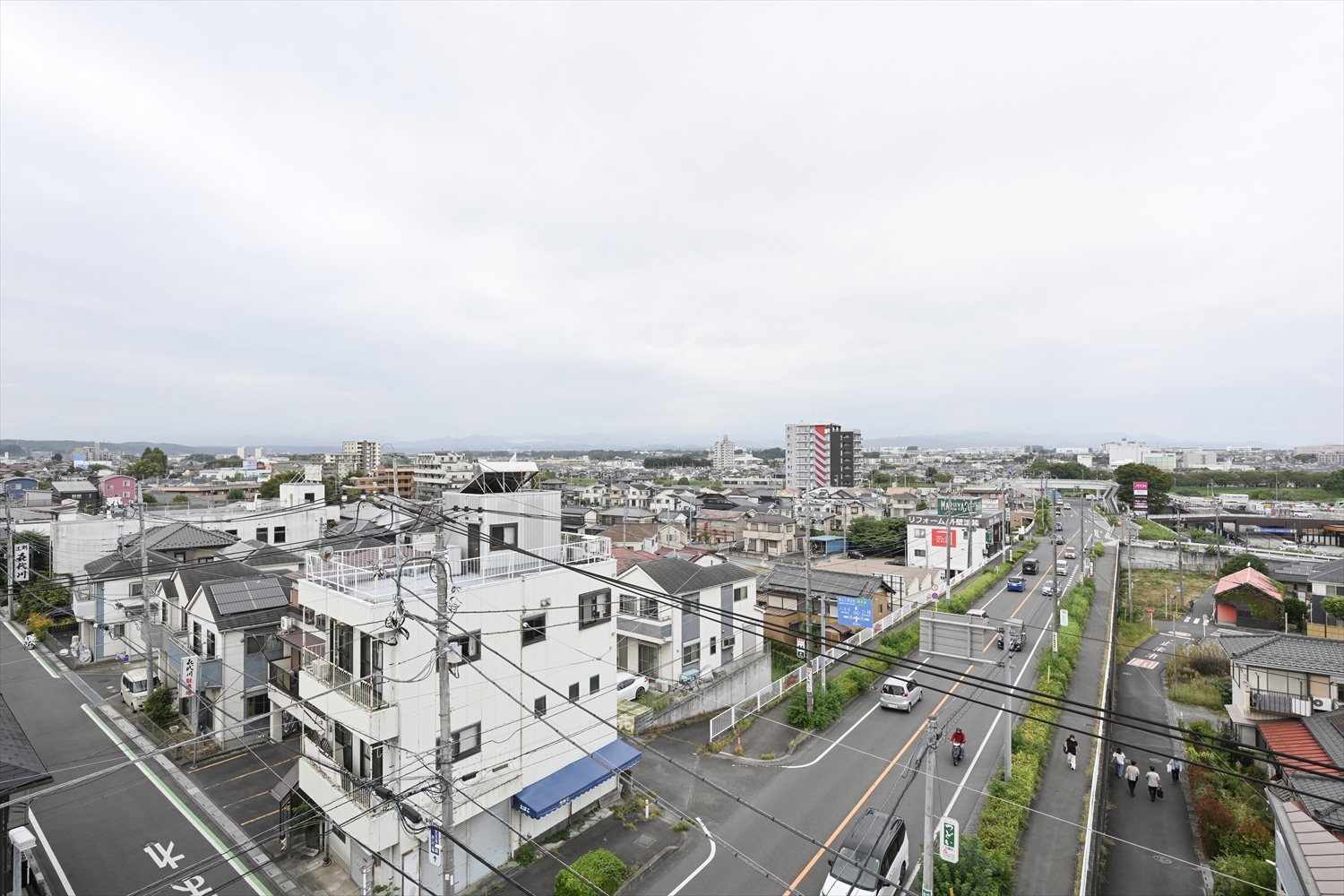 校舎屋上から眺めた狭山市入間川の街並み