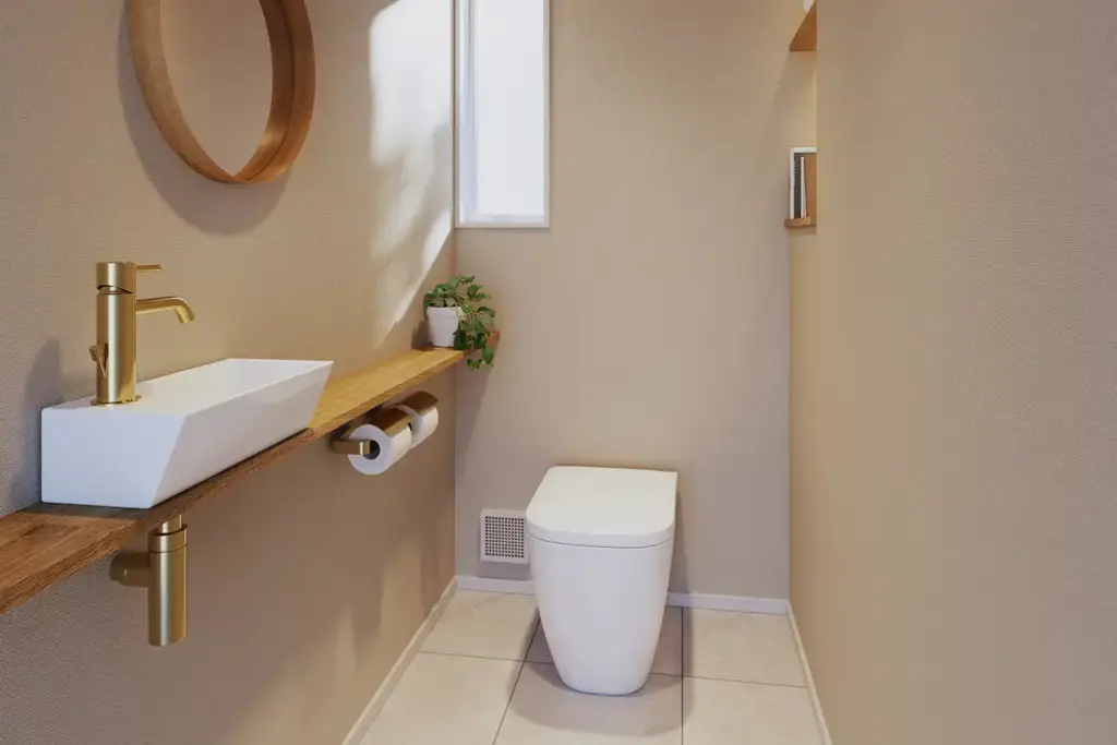 注文住宅のトイレ横に収納と手洗いを設けた住まい